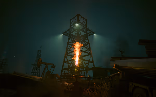 Large oil rig tower with burning flare at center, surrounded by machinery and debris.